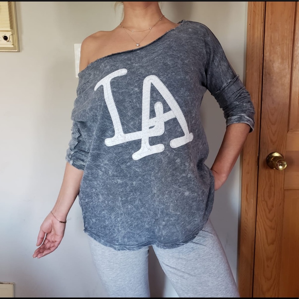 Oversized sweater with shredded back detail